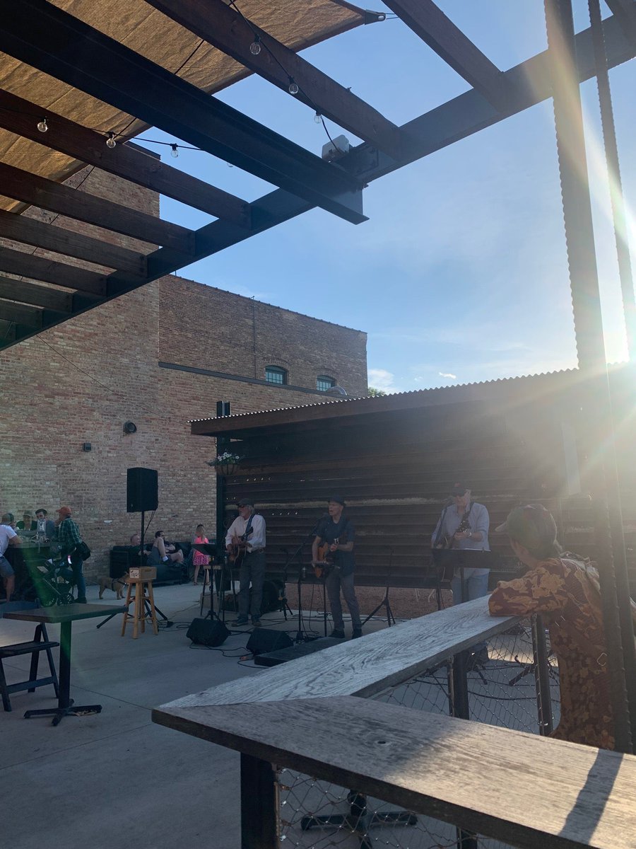 carolineradaj's tweet photo. Enjoying @IansMadison and some beverages on this beautiful evening. Absolutely love my neighborhood. #LiveWhereYouLive #eastsidebestside (@ Garver Feed Mill in Madison, WI) https://t.co/IEMaM0fC9F https://t.co/P9WqMVpDua