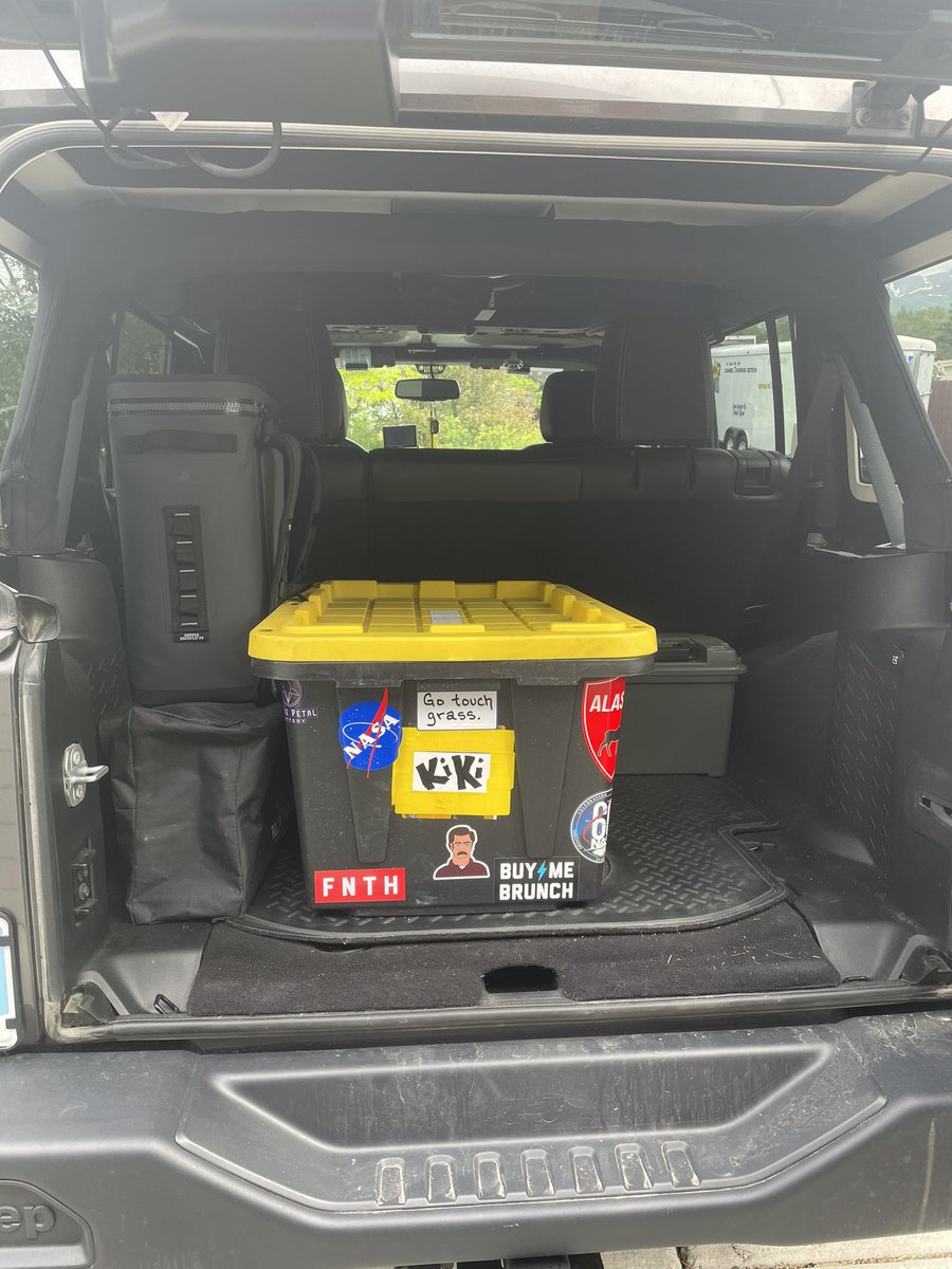 microKodi's tweet photo. The “adventure tote” is back in the Jeep for another fun filled summer. Curated it’s contents over the last 8 years &amp; has everything I need. It’s nice being able to just throw this in and GO.

#JeepLife #camping #stickers #itsadventuretime #nickname #alaska #getyourassintonature https://t.co/WQZw10nlii