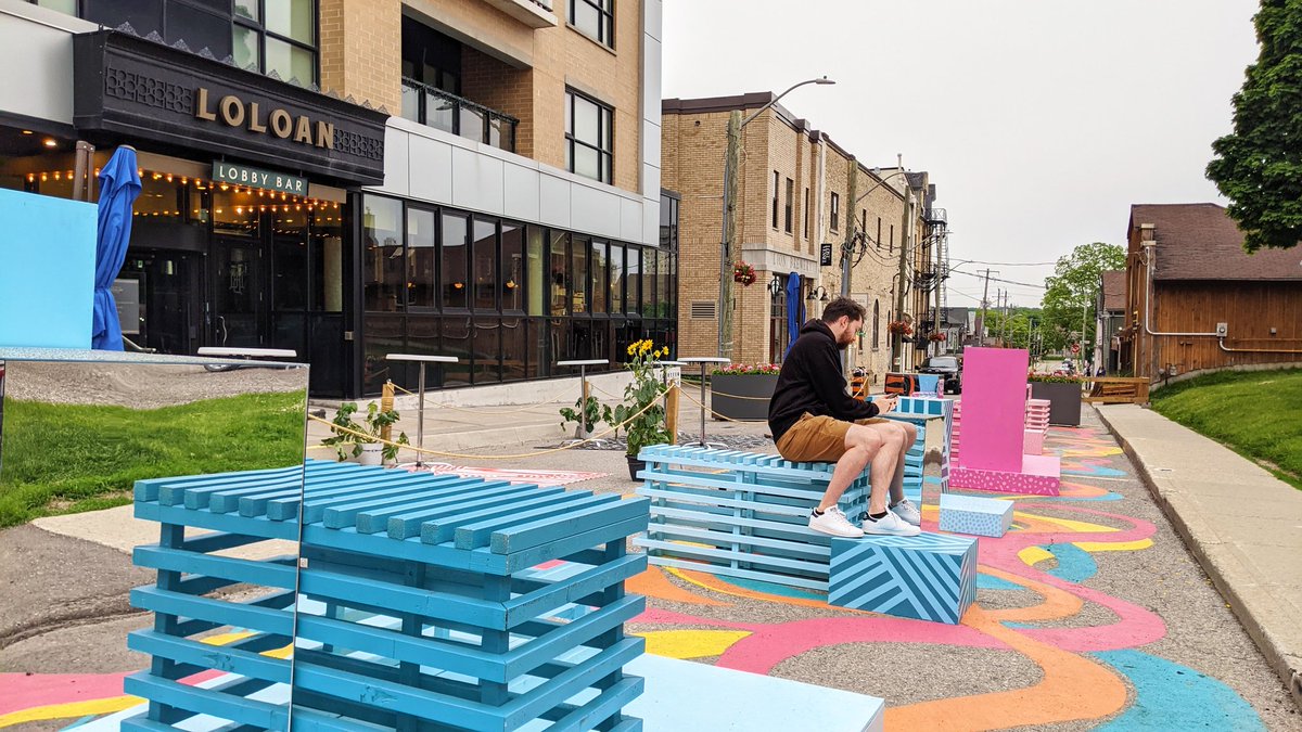 designoutsider's tweet photo. A few clouds can't hold back the colour.☁️ Great to stroll along Princess St. W. @uptownwaterloo Piece by Kitchener-based designer Amy Esplen. See and share more transformations @ https://t.co/2MlwR1qsKu https://t.co/QBoPS10pcb