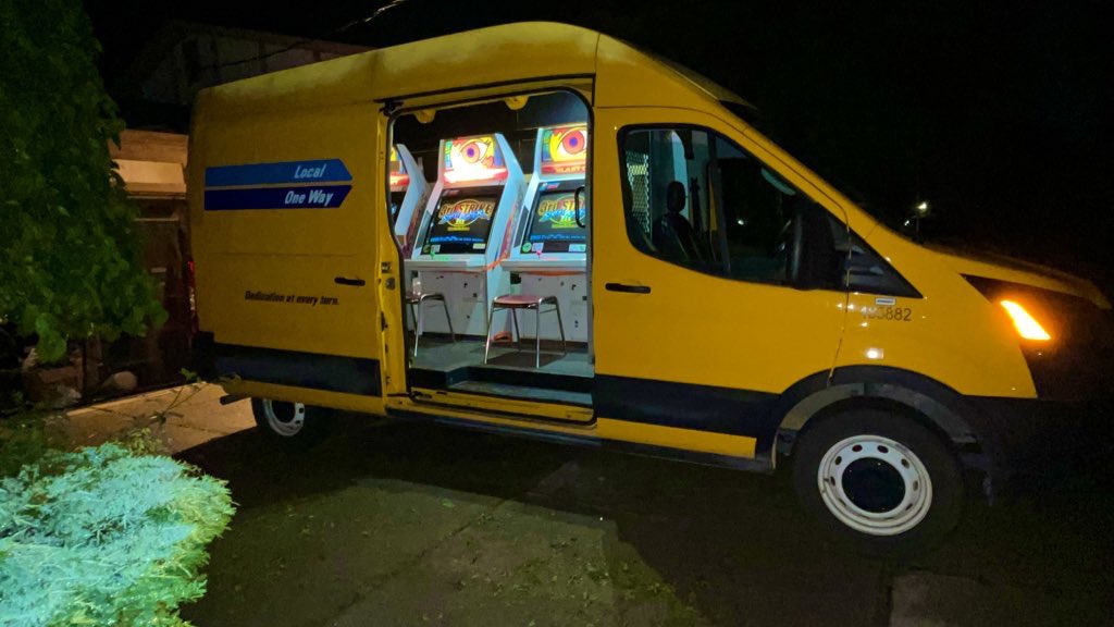 wandering late at night you hear a familiar attract mode sequence in the distance… getting closer to the sound and soft glow on an otherwise dark night, you see it… a 3rd Strike arcade setup in a cargo van… where did it come from? … does it matter? do you put a quarter up!?