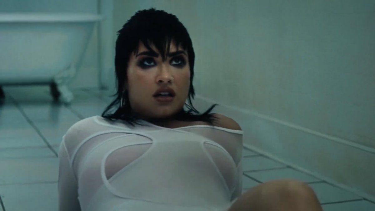 PopCrave's tweet photo. Demi Lovato has released the music video for their new single, #SkinOfMyTeeth. 

Watch: https://t.co/T9CAuHcdkB https://t.co/ERXa6zbtzd