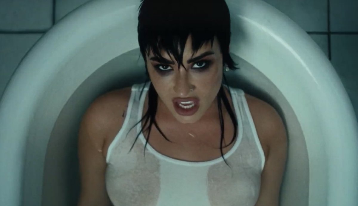 PopCrave's tweet photo. Demi Lovato has released the music video for their new single, #SkinOfMyTeeth. 

Watch: https://t.co/T9CAuHcdkB https://t.co/ERXa6zbtzd