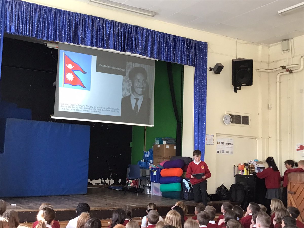 WellfieldMiddle's tweet photo. KS2 are enjoying one of our student-led assemblies: Rowan in Y5 is sharing his interest of Everest explorers with everyone and telling us about different explorers. He has made this in his own time and even had homemade videos to show us. Well done Rowan! #WMSCommunication https://t.co/w8PAIUh3j3