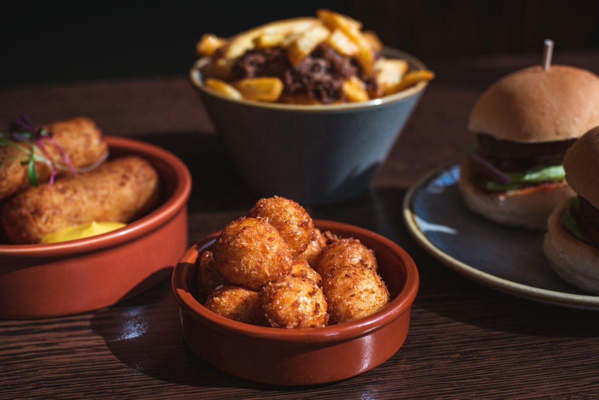 We offer a fantastic range of tasty dishes at our on-site restaurant and bar, <a href="/GalleryAtMalone/">Gallery Restaurant</a> and The Greyhound Bar.🍴

Tuck into our Cheese Bon Bons with Truffle Honey, Colcannon Croquettes, Dirty Fries and Mini Slider Burgers. 🙌
Learn more → bit.ly/3lyMqnD

#Belfast