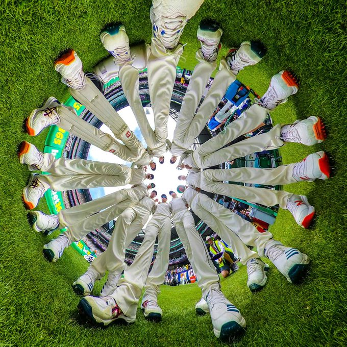 New Zealand captain Kane Williamson speaks to his team on the third day of the 2019 Boxing Day Test at the MCG. Scott Barbour's fisheye picture was shortlisted for the 2020 MCC Wisden Photograph of the Year