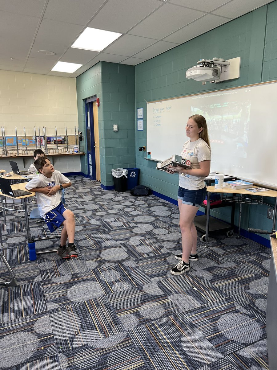 BerryBunch151's tweet photo. Morgan sharing her knowledge of robotics with our summer learners by demonstrating Athena’s design and viewing the battle bot competition after we studied and designed robots this week. @wearemadisonblue #robotsarethefuture https://t.co/tS4Jb6IBiV