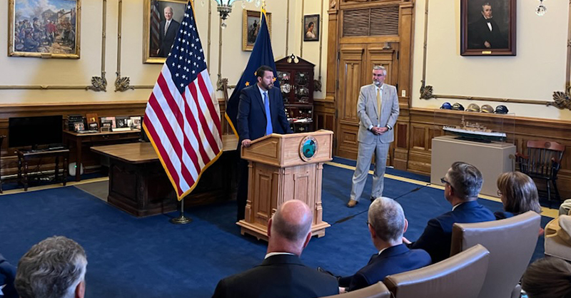 Justice Molter speaking at the Governor's appointment.