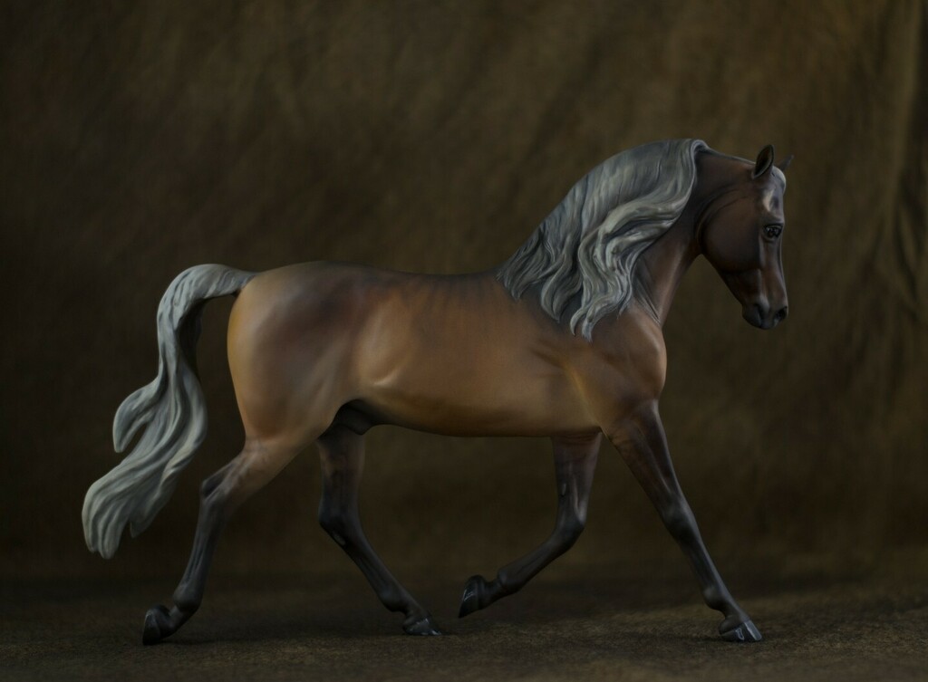 AliciaSVogel's tweet photo. A silver dun on the Troubador mold. He’s based on the real morgan “Coulee Bend Talisman.” My entry in the finishwork division for the Breyerfest Customs Contest. He was one of those models that painted itself, which was a welcome suprise. #breyerfest2022 #breyercustom #mares… https://t.co/nJcx0tywu3