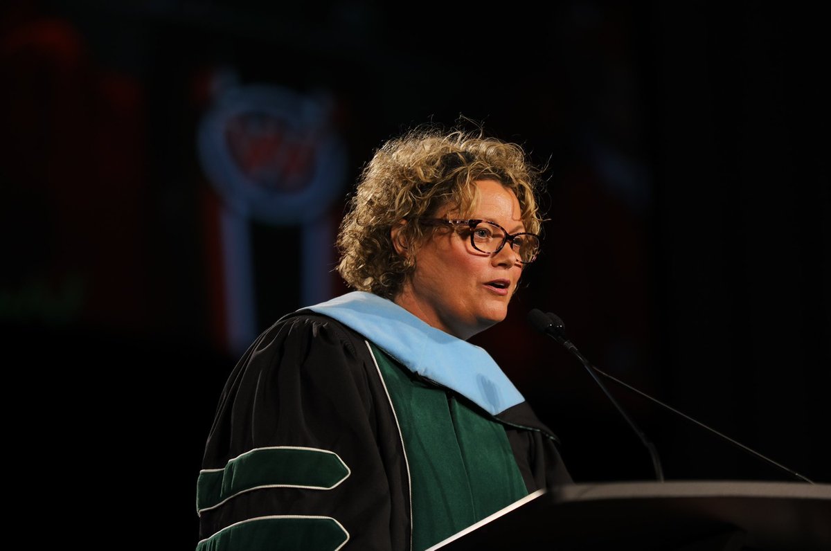 CabCoSchools's tweet photo. West Cabarrus High School Principal Liz Snyder addresses the school’s inaugural graduating class and tells them how amazing it feels to take first steps — again and again. 
🖤🎓❤️# cabcograds22 @CabarrusWest https://t.co/gJ65bYL4eP
