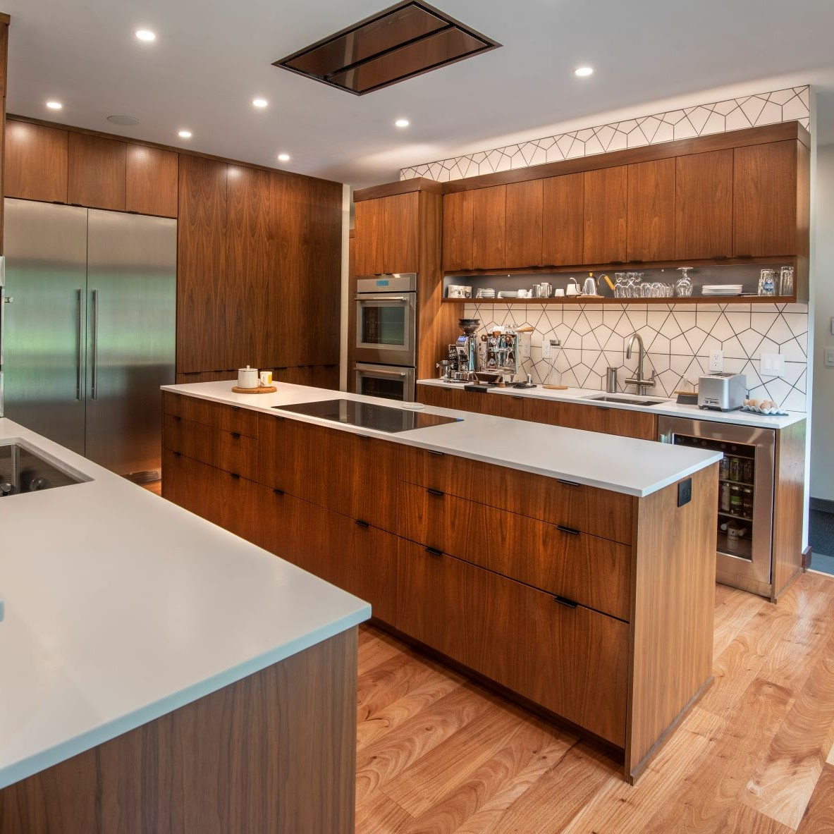 This beautiful kitchen has custom-made cabinets from PLATO, a custom cabinetry line we carry. With PLATO, you can have any size, wood finish, door style... the possibilities are endless! #kitchendesign #kitchenproject #kitchenreno