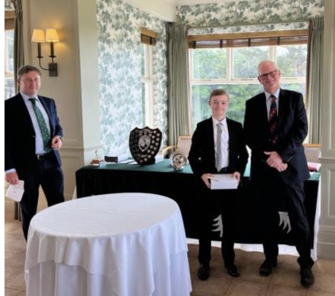 Receiving my trophy at Formby GC from the mens captain. First of many hopefully.