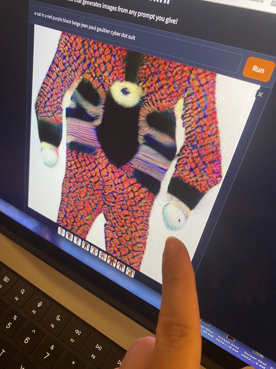 If you’re wondering what a cat in a Gaultier cyber dot suit looks like…