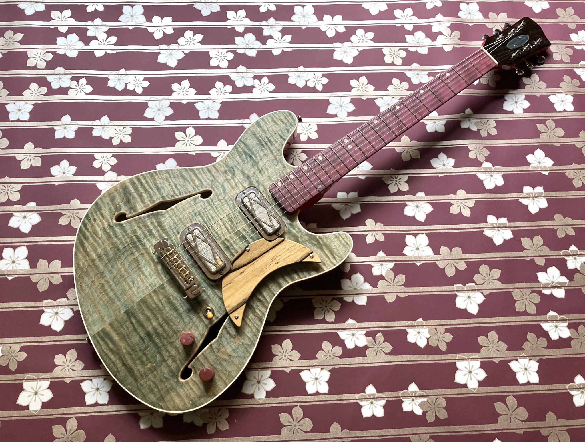 Wisteria Guitars on X