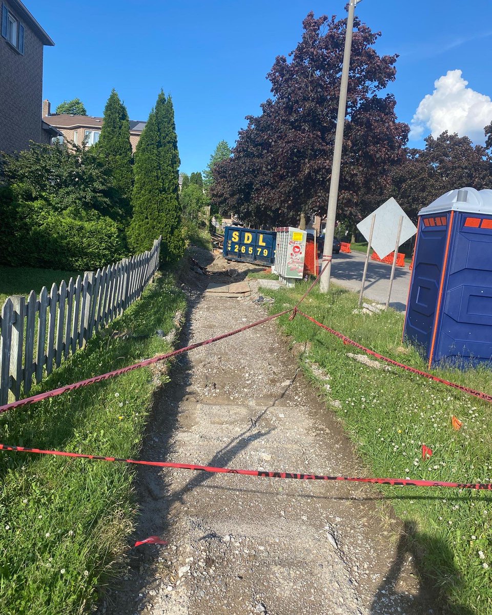 TracyHuntington's tweet photo. @TownOfAjax should be ashamed!! This was supposed to be a retaining wall replacement. Eight feet of backyard gone and whole sidewalk is gone. Contractors are no shows for best part of a month 🤦‍♀️ Please get your shit together. Totally unacceptable 😡 https://t.co/RFfFHxTyzA