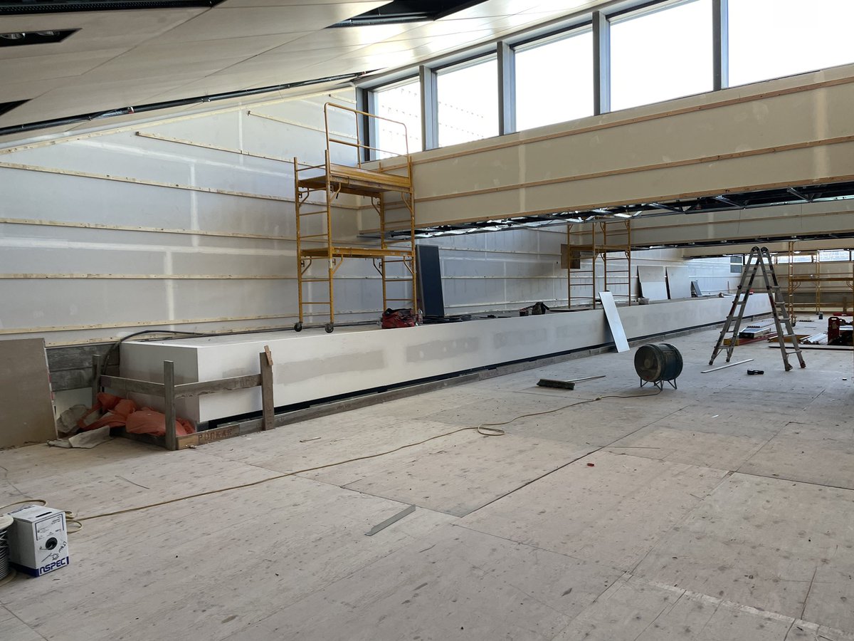 EDMathisonHall's tweet photo. Wood paneling is going into place in our atrium. Photos from our temporary 4 story scaffold . #MathisonHall #EllisDon #Haskane #construction #Ucalgary https://t.co/l8FXQNuMNg