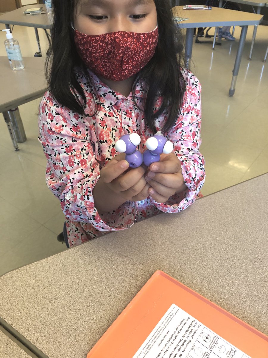 Hey! Check out my molecules! Purple and white are so amazing put together, but what is it?