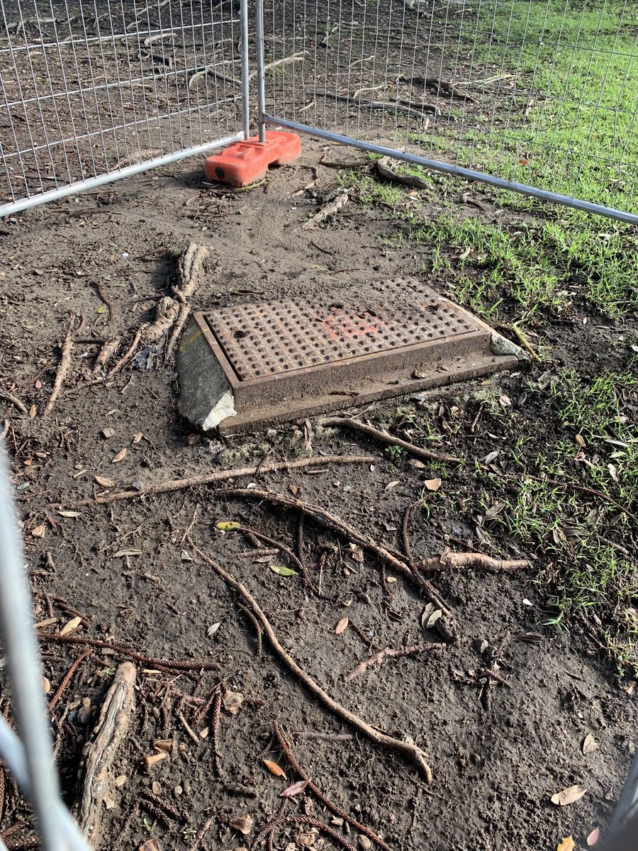 nathanlon's tweet photo. @aucklandcouncil please can you explain this ‘danger’? It looks like a man hole/drain opening with a cover on it. Can you at least write something more specific on signage. https://t.co/4MPmWm2qWg