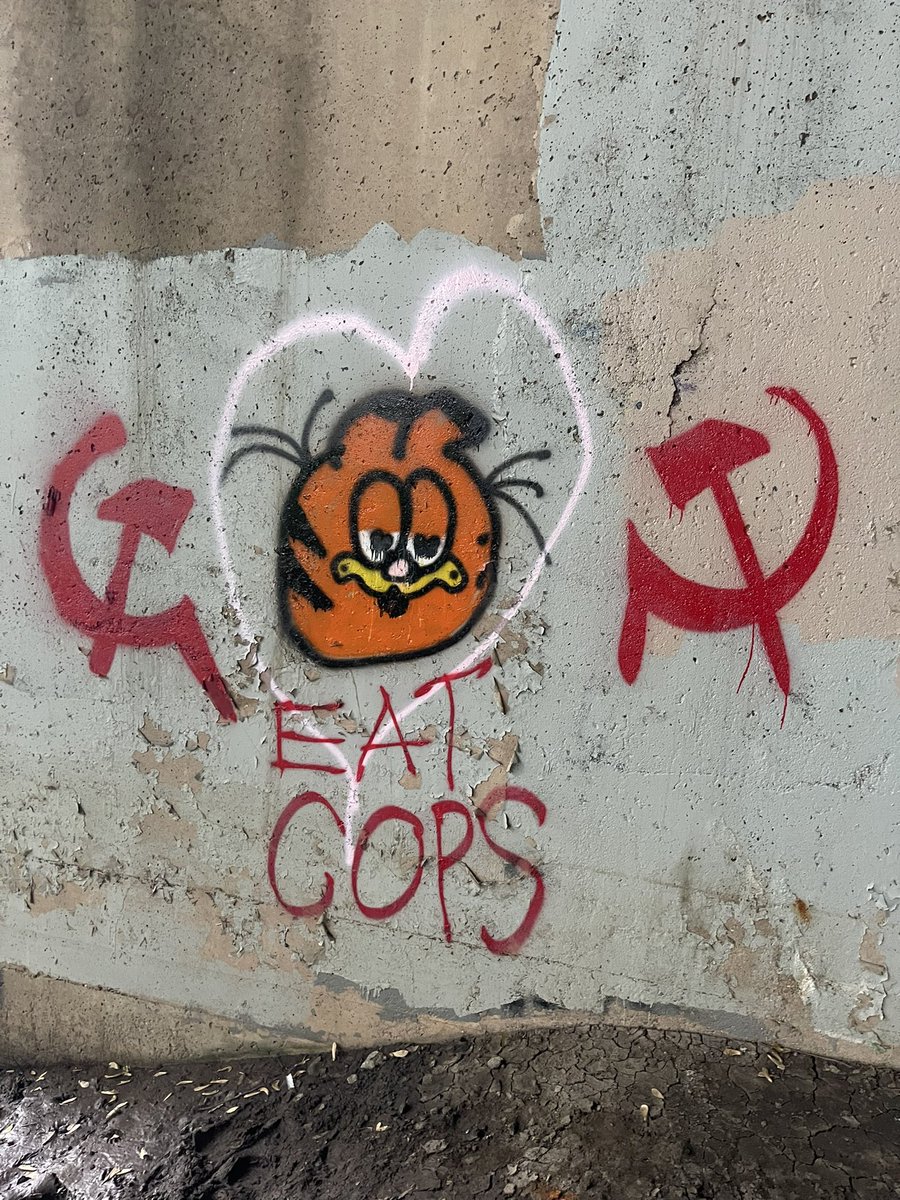 "Eat Cops"
Garfield graffiti seen in Indianapolis, Indiana