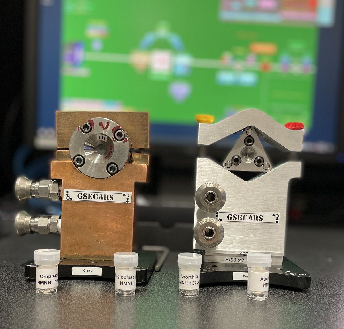 DAC stands for diamond anvil cell. These 2 are looking like Star Wars characters. They are holding pyroxenes for lithosphere mineral physics experiments.