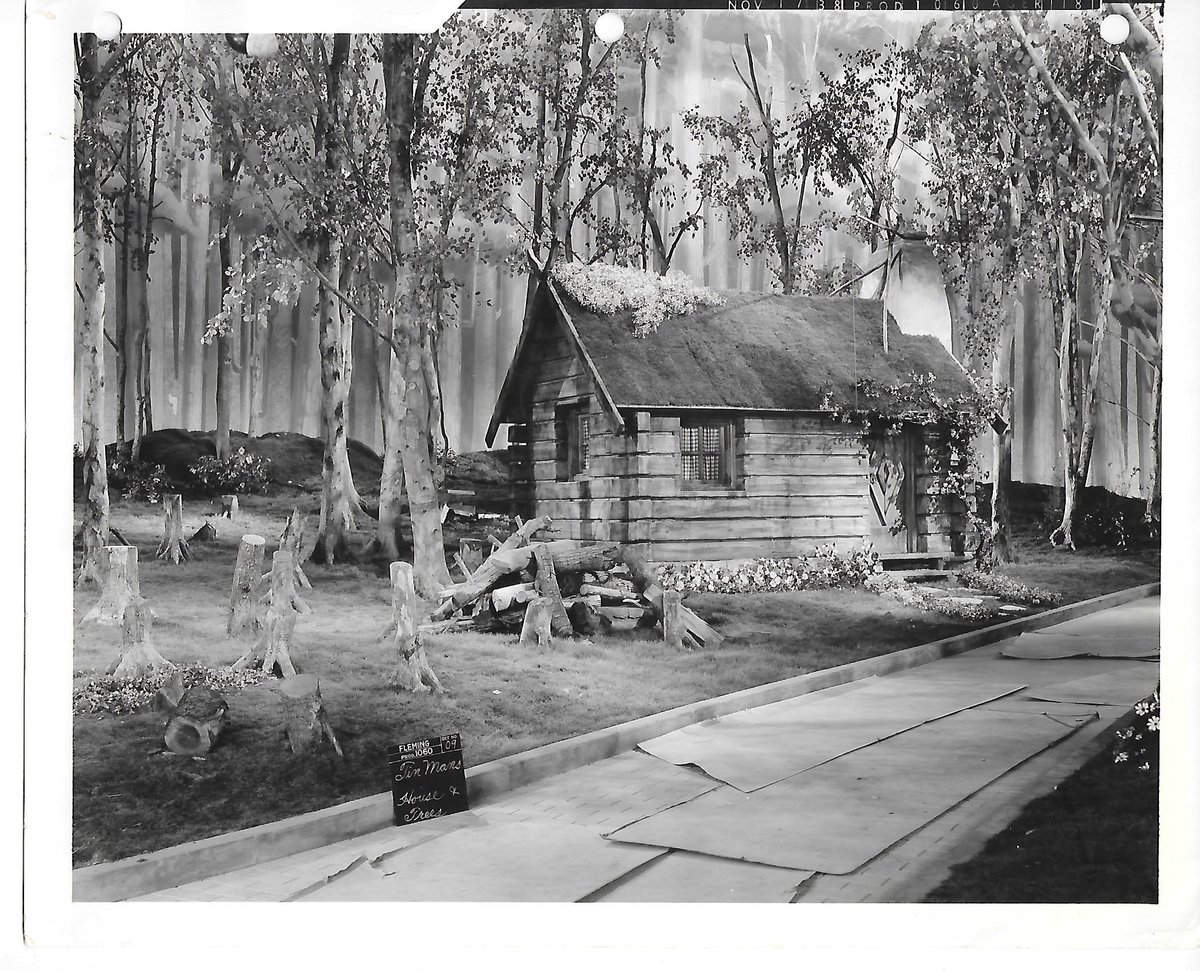 HeffernanCarrie's tweet photo. Set No. 09.
Tin Man's House &amp; Trees.
Dated Nov ?7, 38.
Thanks to modern scanning technology, the wonderful details of this photo are revealed that are hard to distinguish when I view the original photo. 🤩
#JudyGarland 
#Happy100thBDay
#JudyGarland100 
#TheWizardOfOz 
#TCMParty https://t.co/64uF9lNsIh