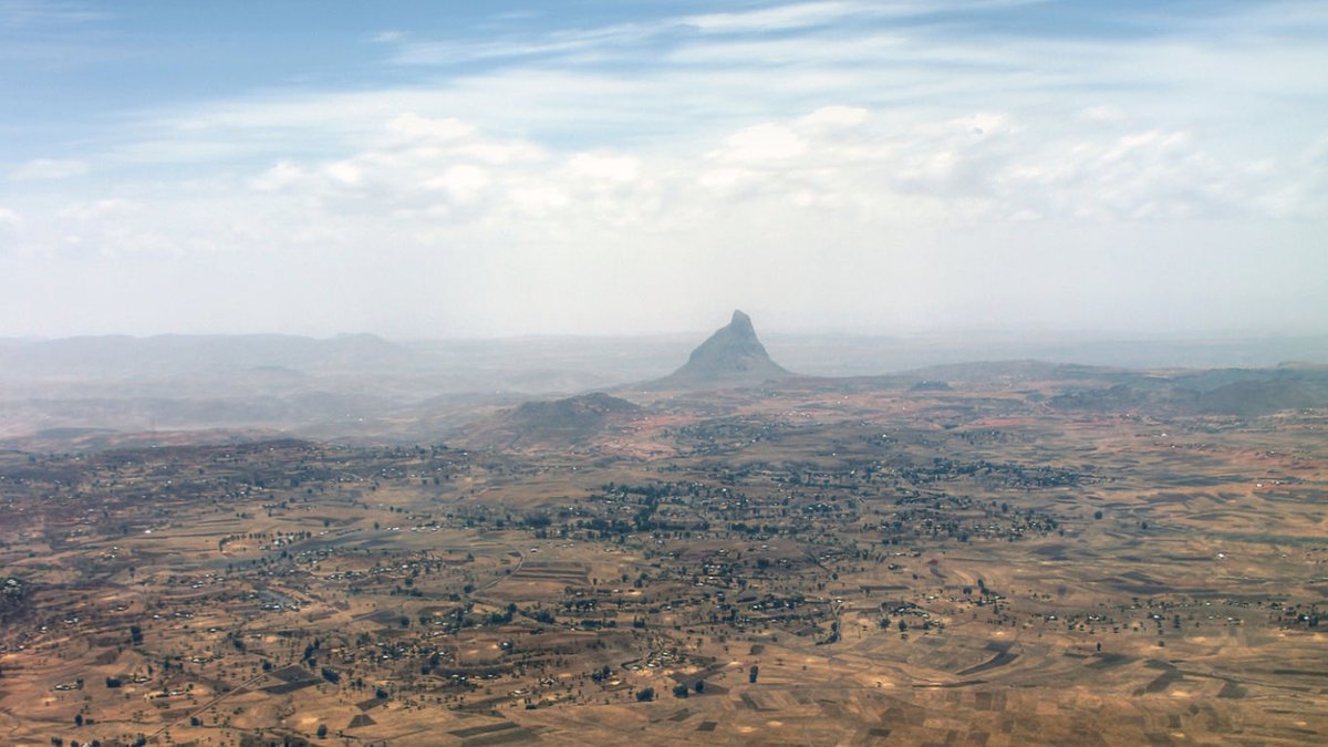 Mount #Gelila

Projected high up the sky around #MahbereDego, 13km southeast of #Axum, mount Gelila stands at 2,580 m.a.s.l. Facing the mountains of #Adwa in the north, there is a story in the village about how Ahmad Gragn failed to destroy a church atop this graceful mountain.