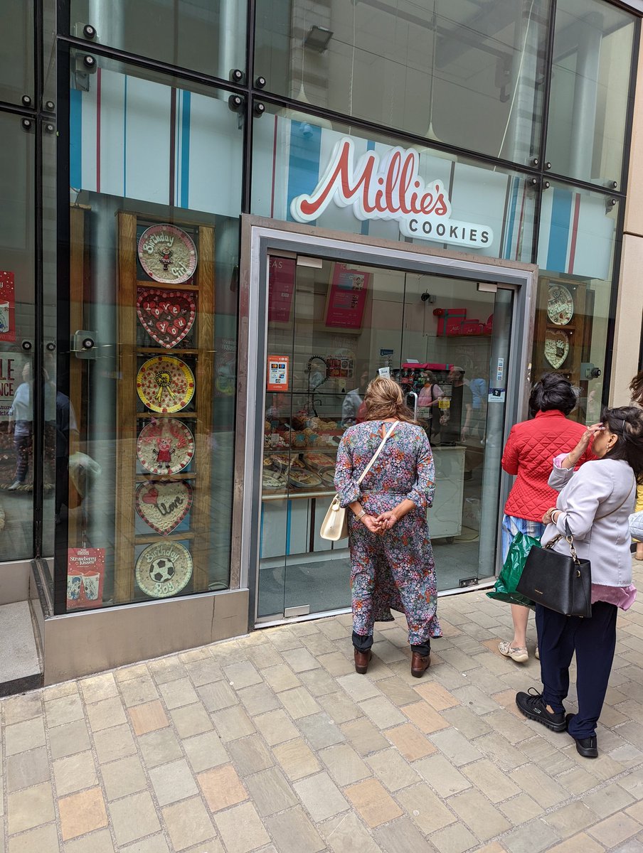 StewRobertson79's tweet photo. Come on @MilliesCookies it's been at least 20mins, why are you not open for all these people https://t.co/mI9syXaChW