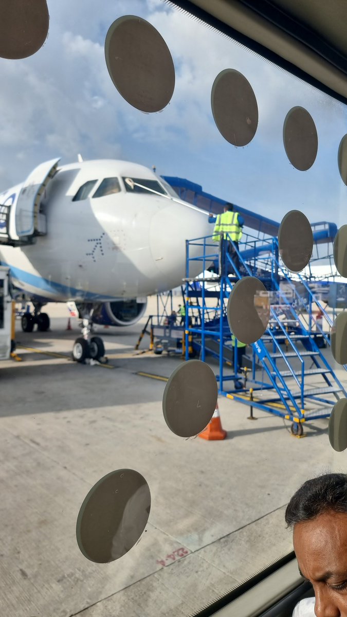 atulshinghal's tweet photo. Have to give it to Indigo. 

They genuinely treat customers like Cattle... Absolutely no customer care. All the passengers Herded into 3 buses, and then all made to wait on the tarmac for 15 minutes while the ground staff cleans the plane.
And one guy the windshield

@IndiGo6E https://t.co/qKiTFblSJi