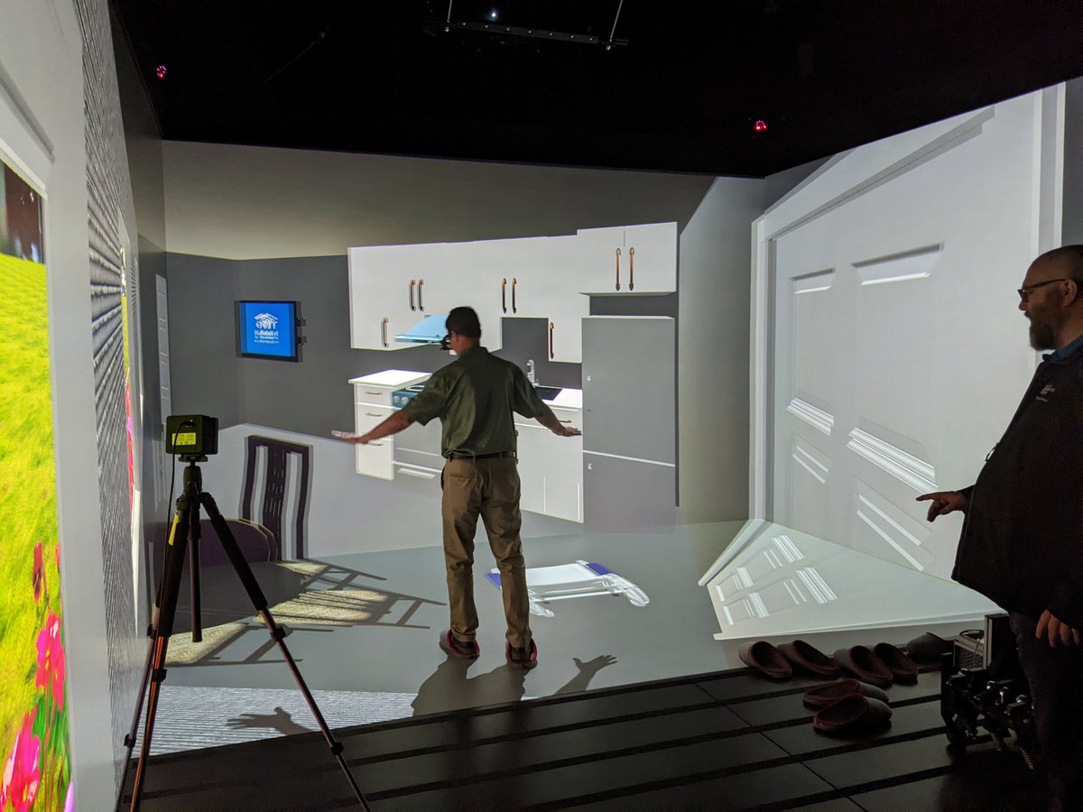 WEConstrAcademy's tweet photo. Students from St. Joseph's Tech Design program (Mr. Spina's classes) are at the Invest Windsor Essex VR Cave exploring the 3D planning that went into the design of Canada's first 3D printed house being built by Habitat for Humanity Windsor Essex. https://t.co/NnYiPFYsSF