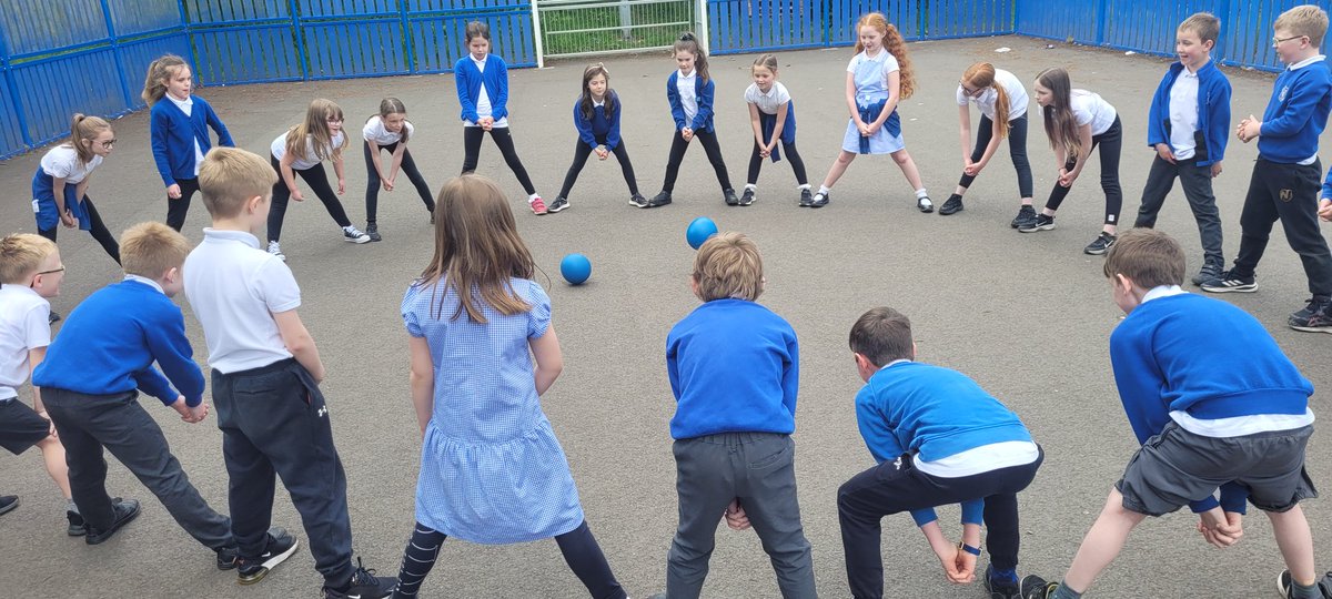 We then played a new game where we had to only use our hands to protect our own space in the circle. We earned points each time we hit the ball through another person's legs. We started in small groups then worked as a class and added 2 more balls for a challenge!