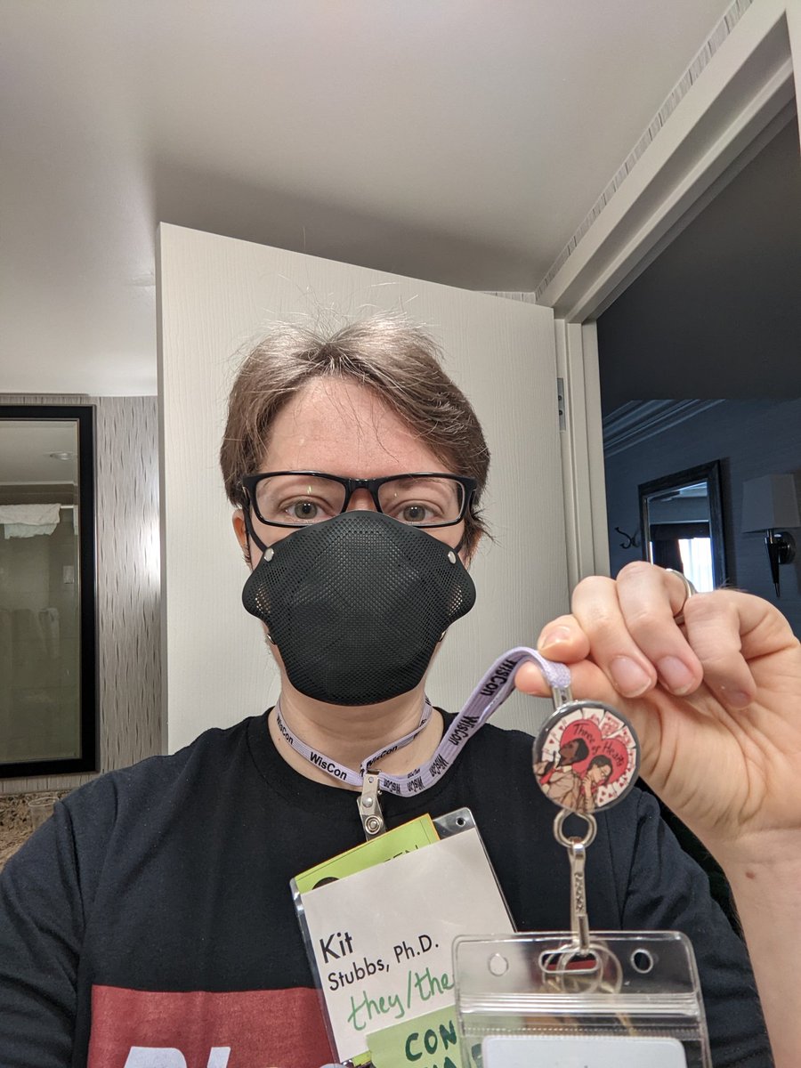Kit_Stubbs_PhD's tweet photo. Hey #WisCon! If you saw me around the con, you may have seen me sporting my new @threeheartscast button designed by @ilaalexei! Three of Hearts is a delightful real play TTRPG podcast by queers for queers. Go check it out! #WisCon45 #WisCon2022 https://t.co/vYgYQQTPhv