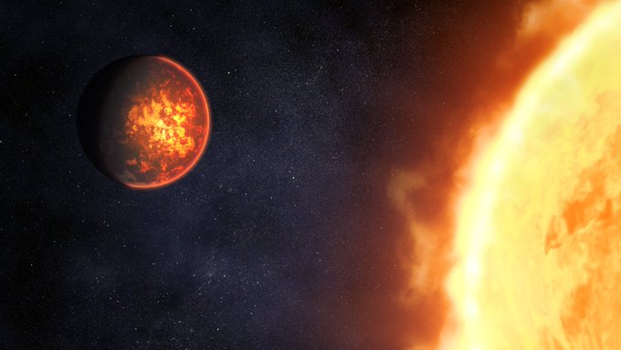 An artist's illustration of a rocky exoplanet in the bright glow of its star. The exoplanet is bright red with a yellowish glow emanating from the star-side. The side of the planet facing away from the star is shrouded in darkness. The star itself is a glowing yellowish orange ball taking up the entire right side of the image, with an orange glow and swirls of darker orange. 