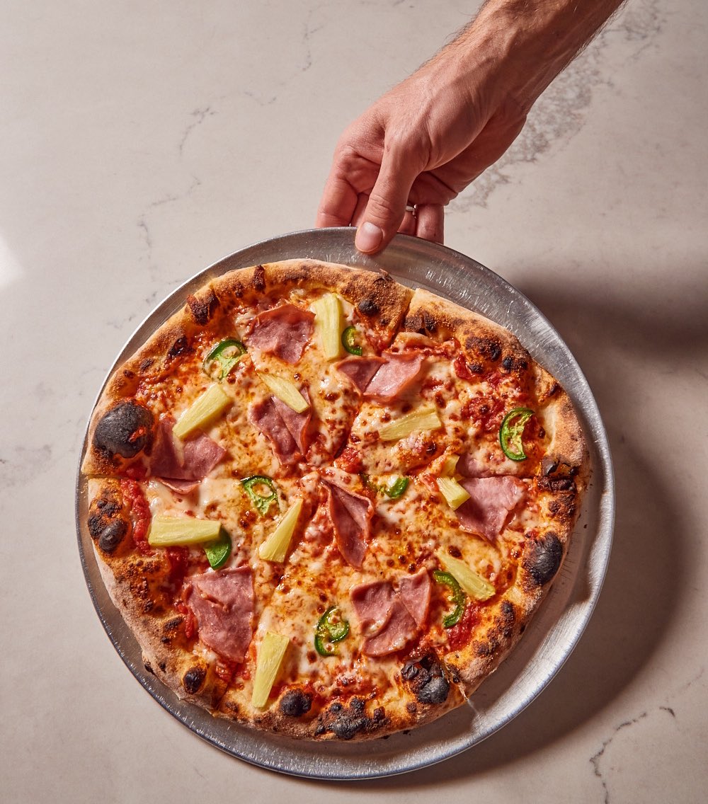 It's not summer until you get a taste of the tropics.
⠀⠀⠀⠀⠀⠀⠀⠀⠀
Celebrate Memorial Day with a Hawaiian Pizza (or two!)