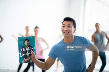 SimuLiu's tweet photo. In celebration of We Were Dreamers hitting the New York Times Bestsellers list, I am reclaiming my Zumba stock photos!! 

Thanks to everyone who bought a copy, and @OliviaMunn and @VancityReynolds for their amazing back cover blurbs. Both way better than @RonnyChieng's. https://t.co/jFlUS73Hrz