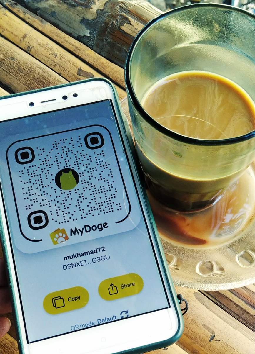mukhamad72's tweet photo. Drinking milk coffee, paying for it using mydoge, is very good https://t.co/J8RduGrmeY