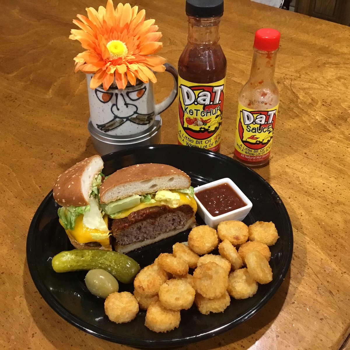 Made today’s #glutenfree #hamburger with some of the leftovers from last night’s <a href="/DaTSaUcELA/">D.a.T. SaUcE</a> #charcuterieboard. Roasted garlic &amp; horseradish aioli, spicy tomato &amp; onion jam, w/ American, Muenster,  &amp; Cheddar. Pickle, olive, &amp; tots on the side!  #celiac #TopChefJr