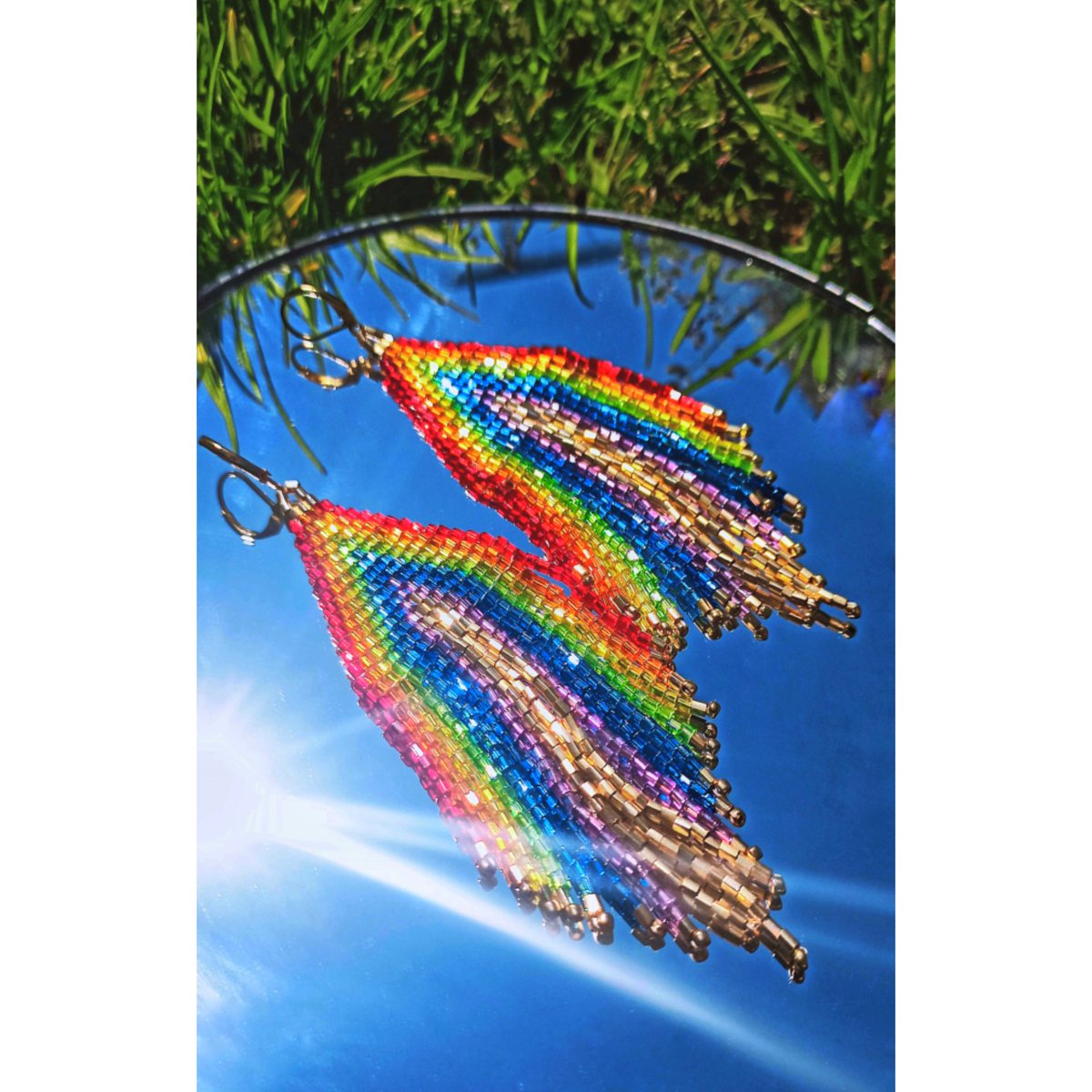 Shine bright like a Rainbow 🌈
#rainbow #earrings #beadwork #fringeearrings #rainbowearrings #jewelry #etsyhandmade #boho #hippie #sky #animals #etsy #sparkly #beadedearring #seedbead #handmade #pride #etsyjewelry #mhhsbd #Alien_Family