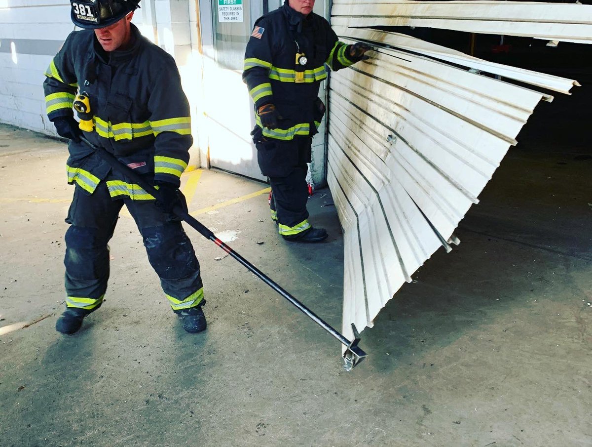 WestfieldFire's tweet photo. Westfield crews exercised forcible entry skills on commercial doors and the correct procedure for cutting through garage doors. #trainingmatters #forcibleentry #savinglives #savingproperty https://t.co/JfJbpBUNI7
