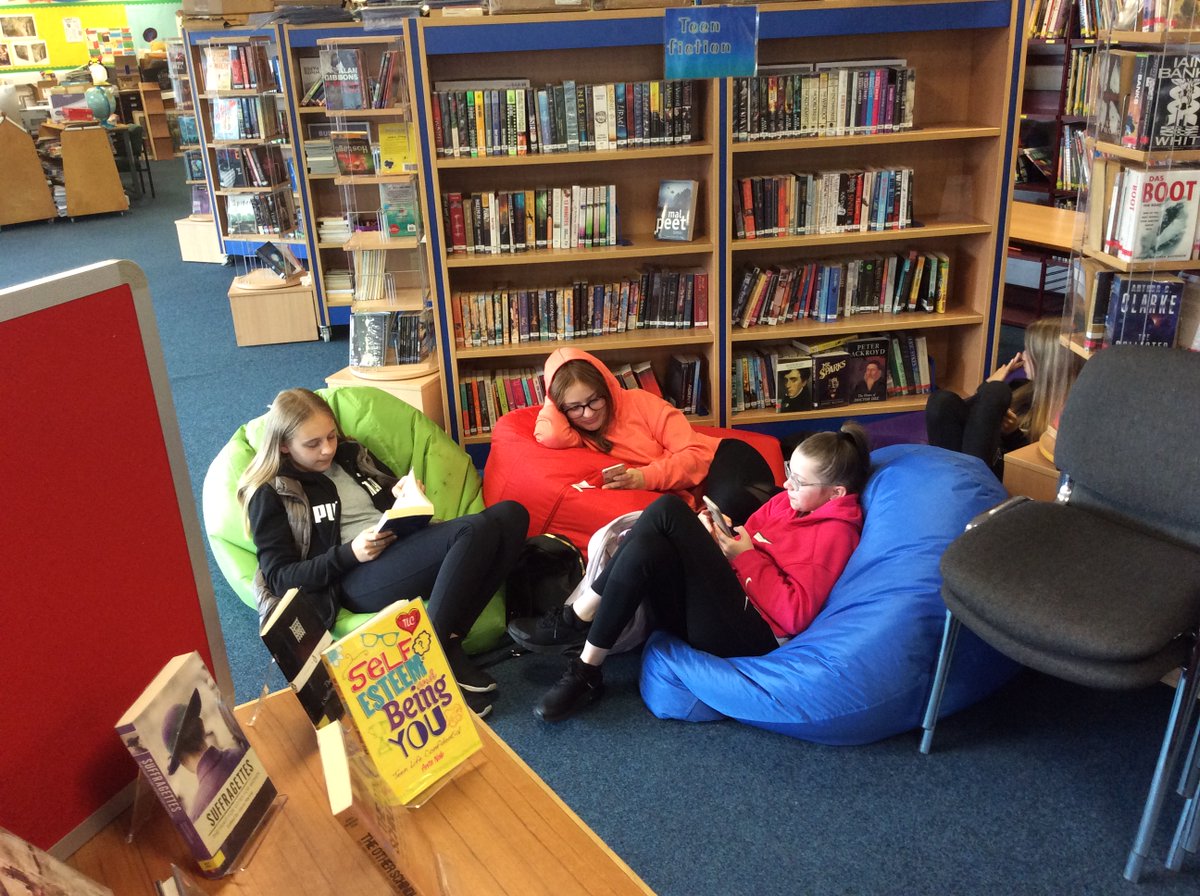 OLHSLRC's tweet photo. Cosy Reading in the Library (with some occasional colouring in) #ActivitiesWeekOLHS https://t.co/gHYDSseu7k