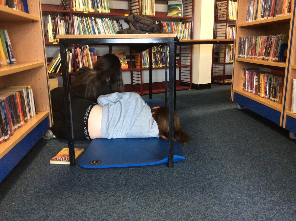 OLHSLRC's tweet photo. Cosy Reading in the Library (with some occasional colouring in) #ActivitiesWeekOLHS https://t.co/gHYDSseu7k