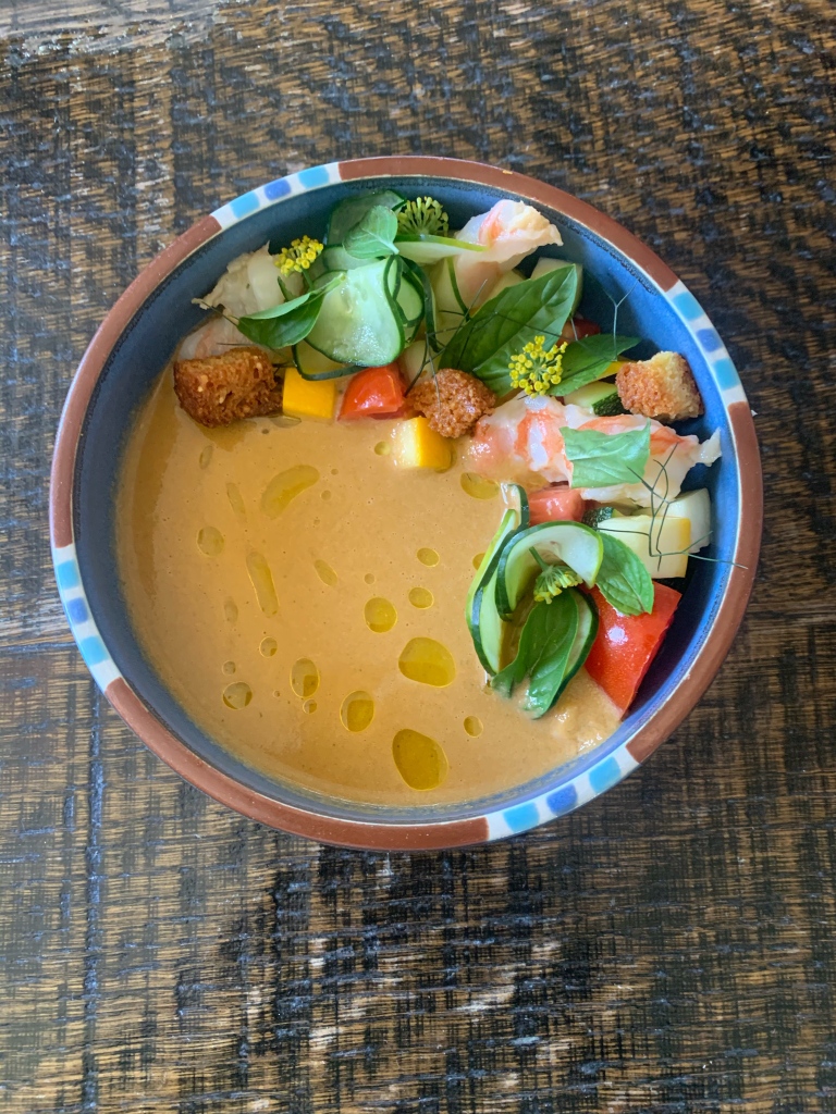 A beautiful bowl of color is just as delicious as its beautiful.

@hausbarfarmsatx gazpacho with poached shrimp is a Rosewood summer much have.
