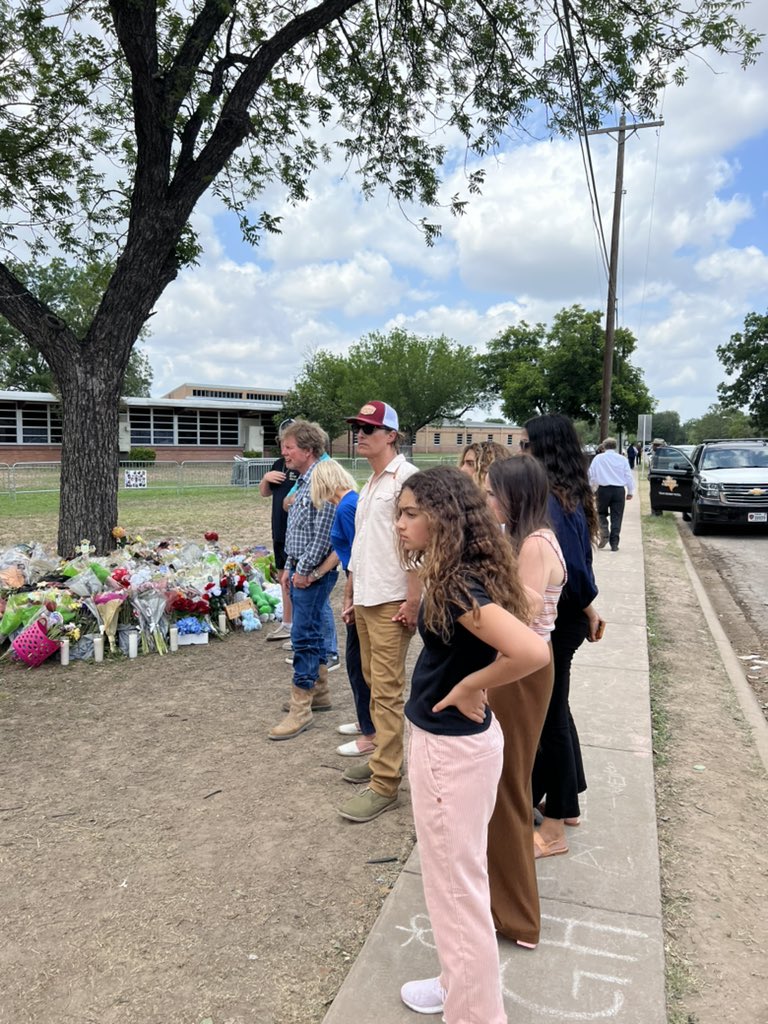 OmarJimenez's tweet photo. Matthew McConaughey visiting the memorial site at Robb Elementary in his hometown of Uvalde. https://t.co/q7tDR8lwAg