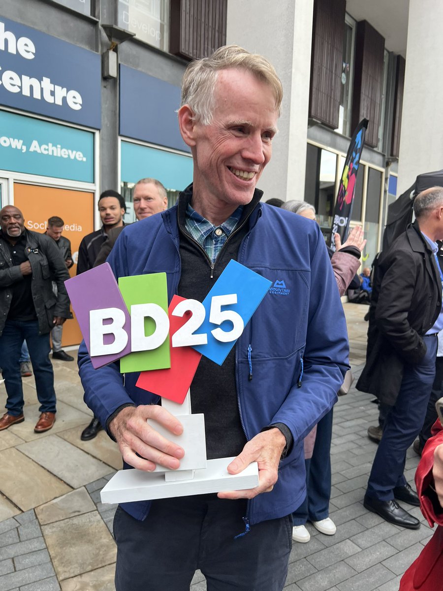 docjohnwright's tweet photo. I got to hold the trophy! Part of a very joyous victory parade for what will be the best City of Culture ever 

@bradford2025 https://t.co/mphUgFNkVd