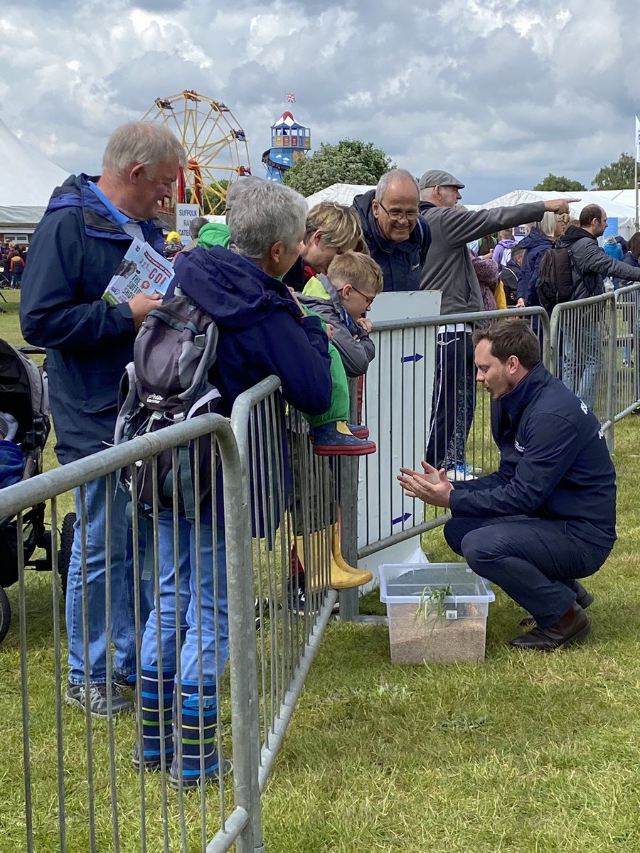 The_Barker_Boys's tweet photo. @SuffolkShow #farminglive explaining modern farming technology like all the bits of this awesome @SandsSprayers and the @CLAAS_UK combine in the background. Come and see us today for more barley facts and commentary on farming. https://t.co/rlA0gADpME