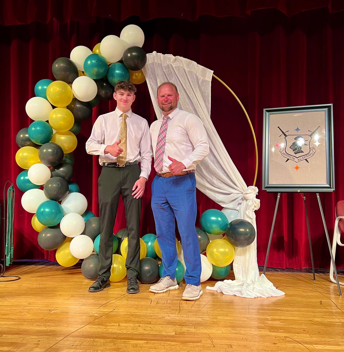 COrlofski's tweet photo. Hunter became a Black Knight tonight at the LL Mission Academy Dubbing Ceremony!  Thank you LL for such an amazing program and Principal Nonnenberg for being an incredible mentor!! 💛🖤💛🖤 https://t.co/hqR6eHYxjz