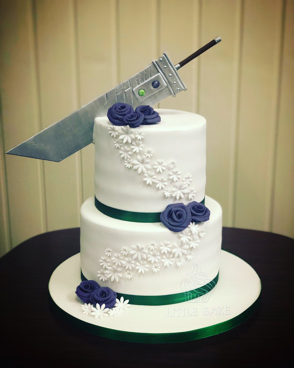 Gamers wedding cake with Final Fantasy Buster sword #FFVII #Finalfantasy #gamers #weddingcake #bustersword #ffbustersword