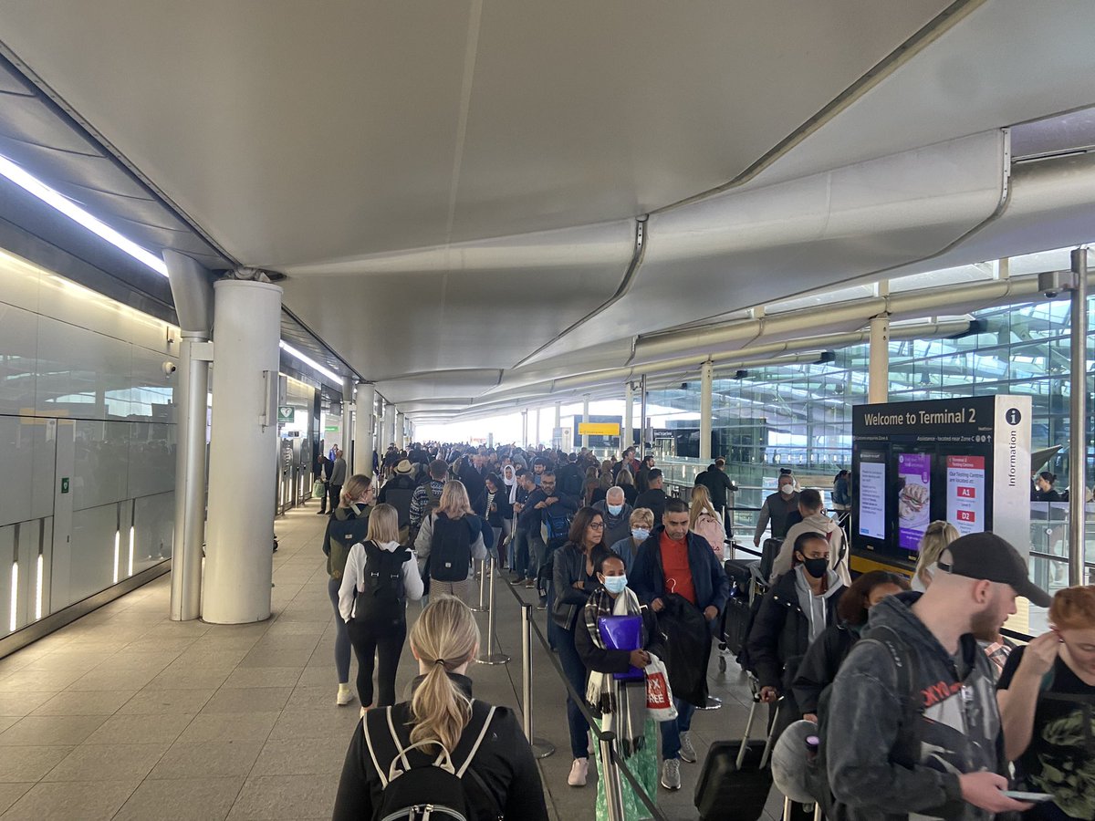 alexjkirk's tweet photo. Staff doing an incredible job at Heathrow Terminal 2 but a truly overwhelming number of people. Once you’ve navigated check in, security queue goes outside the building. https://t.co/2lAbo4XAzk