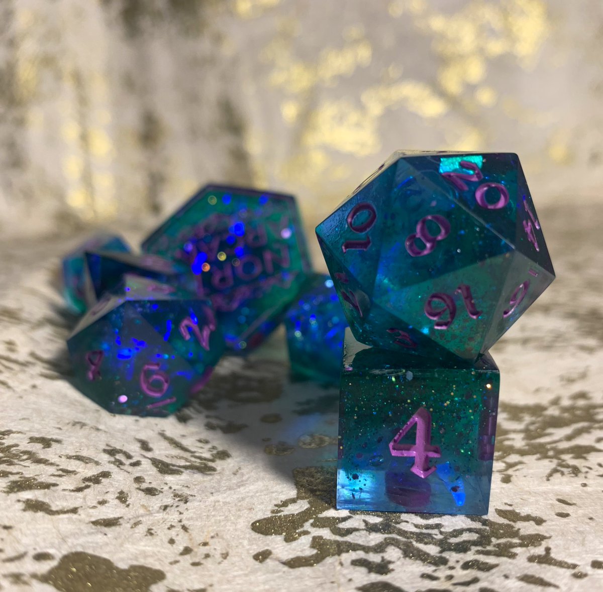 NorthArcana's tweet photo. A commission set for a cowboy character with chaos magic! 

#dnd #dnd5e #dnddice #diceset #dicemaker #ttrpg #ttrpgcommunity #handmadedice #dndcommissions #commissionsopen #commissions #northarcana #york #resinart https://t.co/CRh76eSZ1y