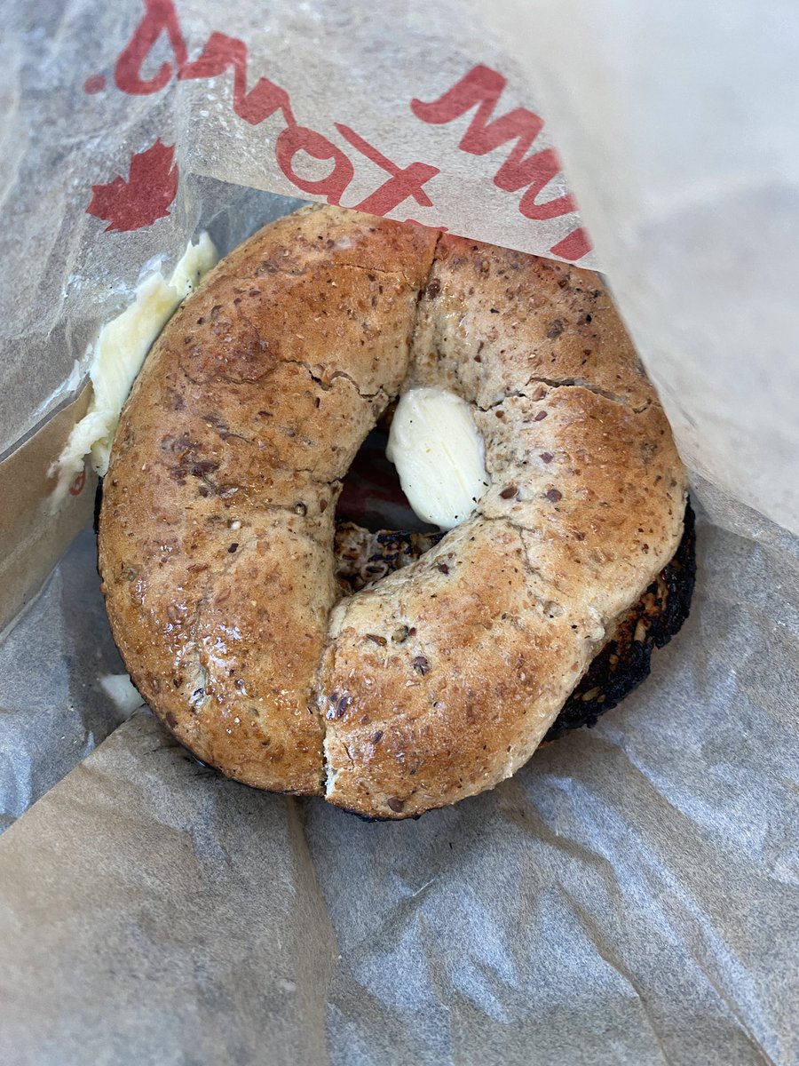 Rachel072967's tweet photo. @TimHortonsYQR Vic Sq location, I just dealt with the crazy amount of butter on my bagel yesterday, and today there’s even more. Asking for extra butter doesn’t mean this. Asking for less ice in iced coffee = short changed on the amount of coffee. Asked for milk and got cream! 😡 https://t.co/RL1jwpmkij
