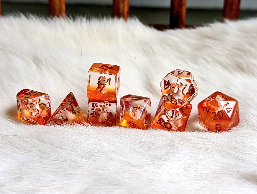 I've got a pocket full of foxes!!! Just look at them! They're so cute! My new creations- Red Fox Dice 🦊🤍🧡 now up in the shop! #dnd #ttrpg #dice cozygamer.com