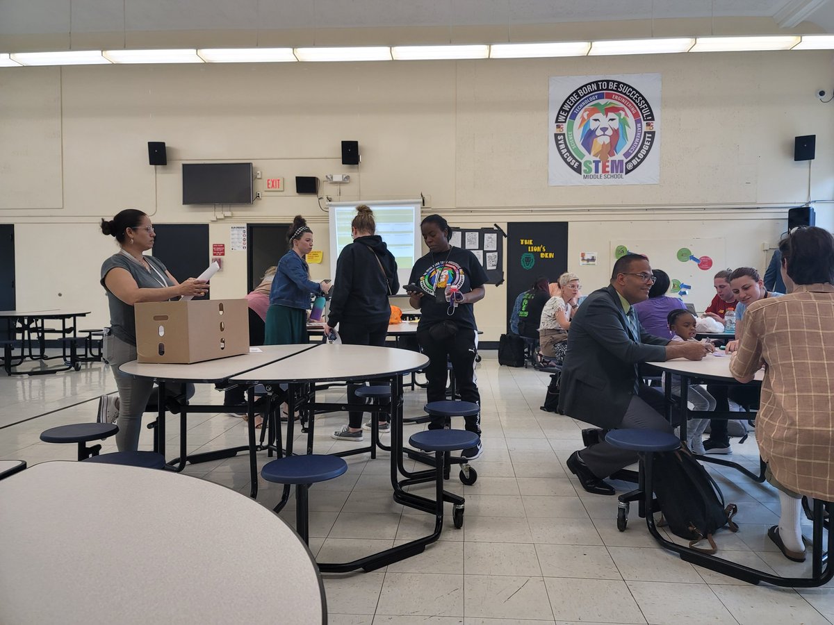 STEMatBlodgett's tweet photo. Syracuse STEM teachers work collaboratively while analyzing student work protocol during Thursday's professional development. #GoSTEMLions #SCSDPL @STEMatBlodgett @SyracuseSchools https://t.co/0TiqOX9axK